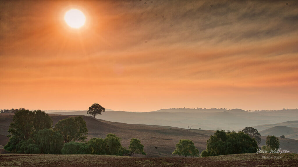 The combined dramatic effect of drought, bushfire smoke and sunset at Guyra