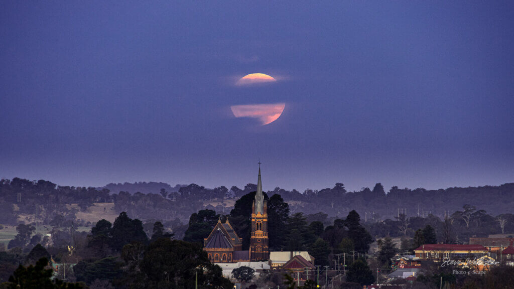 Full moon rising over Saints Mary and Joseph Catholic Cathedral, Armidale NSW